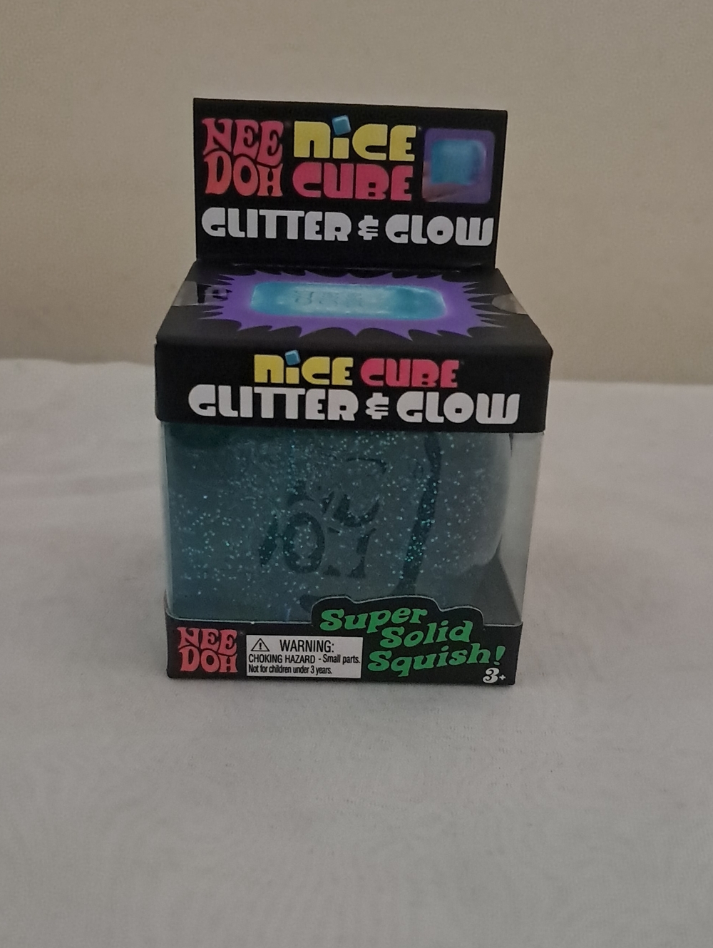 Needoh Nice Cube Glitter & Glow Super Solid Squish - Teal Blue
